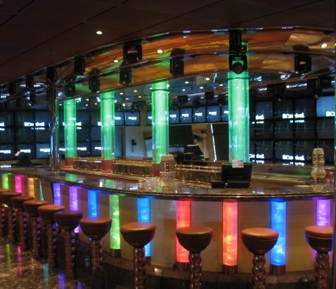 Bar interior with colorful Aquallusion and Ice Illusion illuminated columns